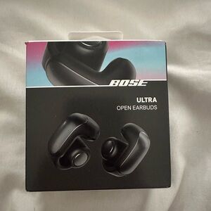 Brand new, unopened Bose Ultra Open Earbuds in Black and silicone case covering